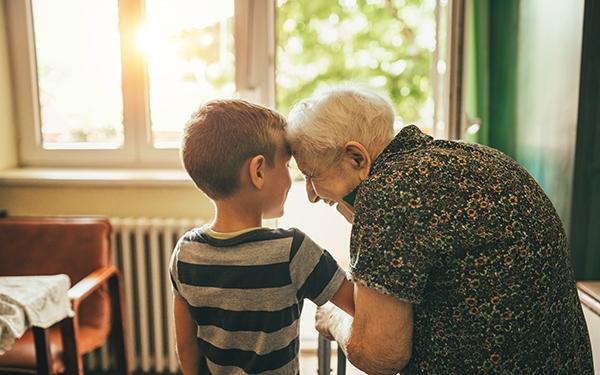 Grandmother and son hugging