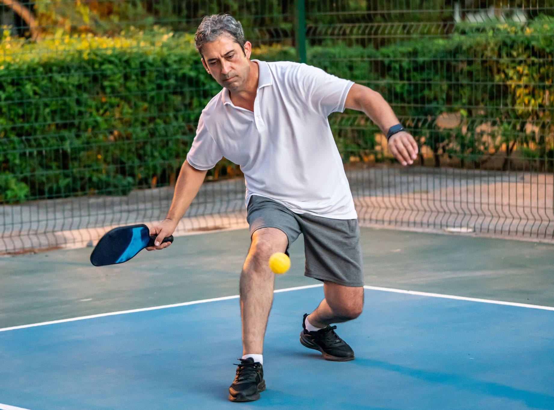 Man playing pickle ball 
