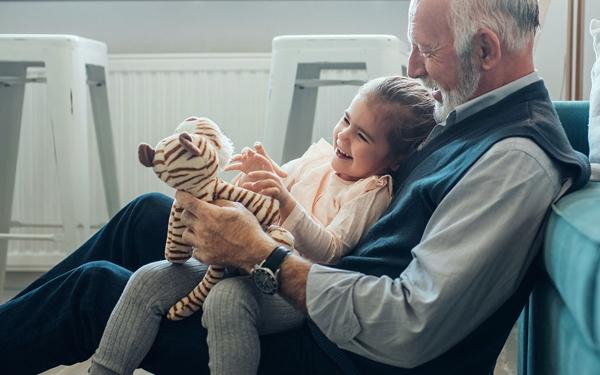 Man playing with grandchild