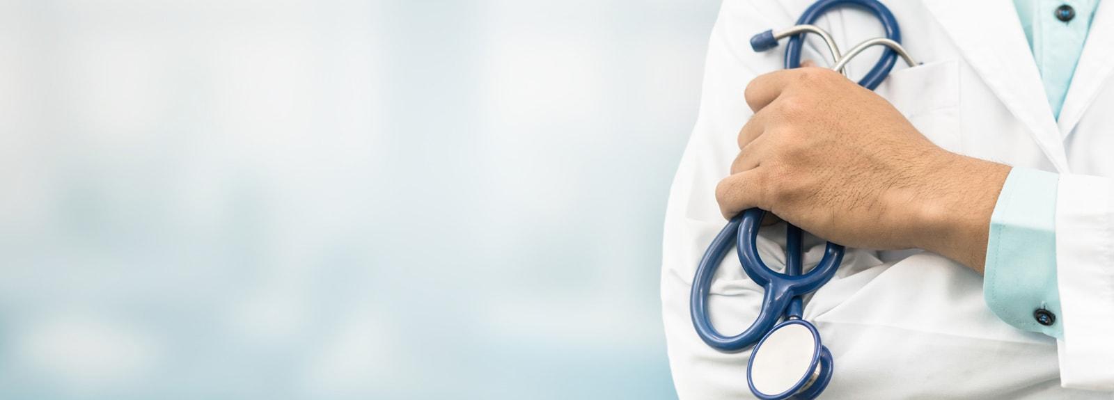 Doctor with hospital background
